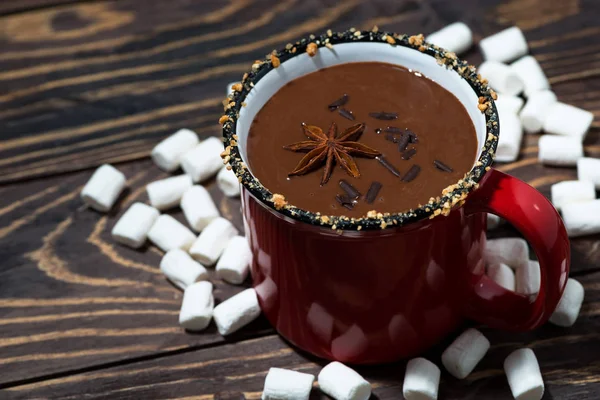 cozy winter drink hot chocolate with marshmallows, closeup top view