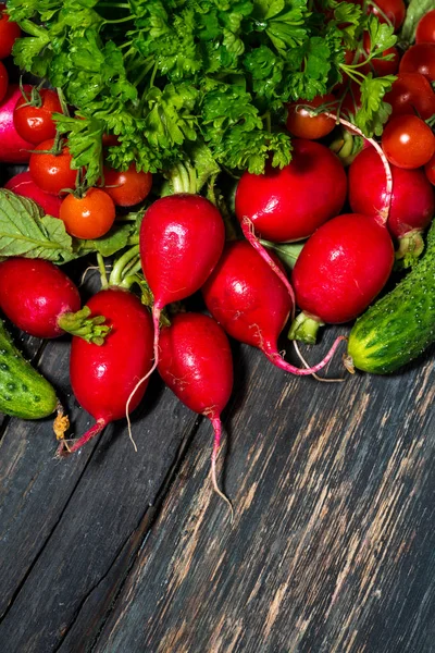 Fresh seasonal vegetables on wooden background, vertical top vie — Stock Photo, Image