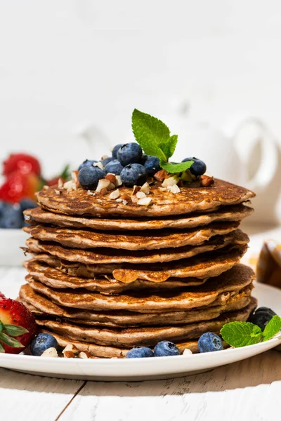 Stack of homemade pancakes for breakfast, vertical closeup — Stock Photo, Image