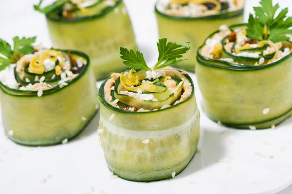 Vegetarian rolls with cucumber and hummus — Stock Photo, Image
