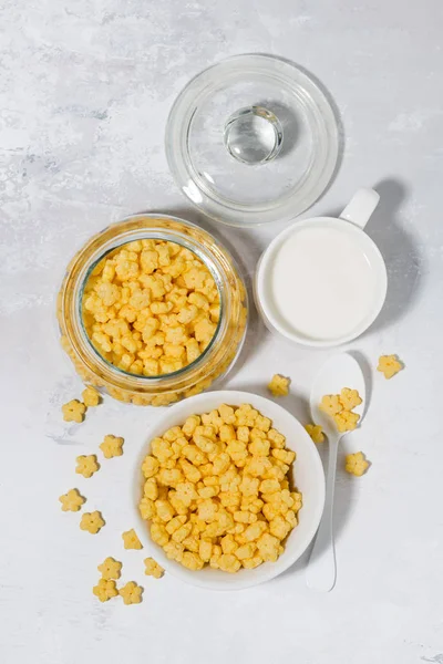 Breakfast cereal for children - crispy stars, top view vertical — Stock Photo, Image
