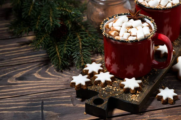 Cozy winter drink hot chocolate on a wooden table, top view — Stock Photo, Image