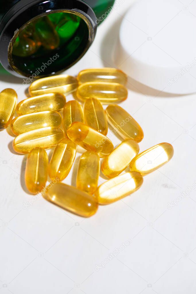 dietary supplement - fish oil capsules, closeup