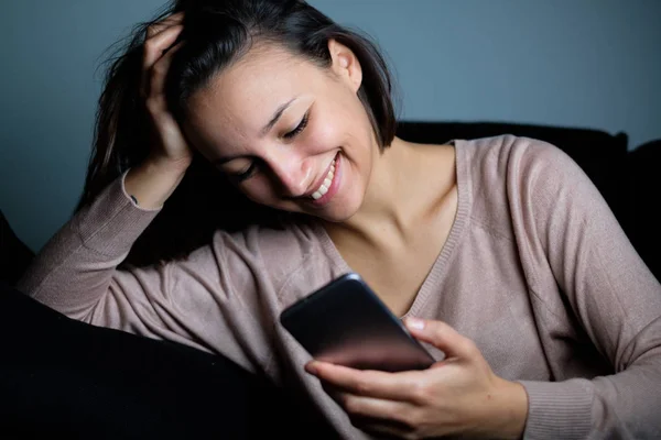 Cheerful Girl Watching Smart Phone Display Night Main Focus Woman — Stock Photo, Image