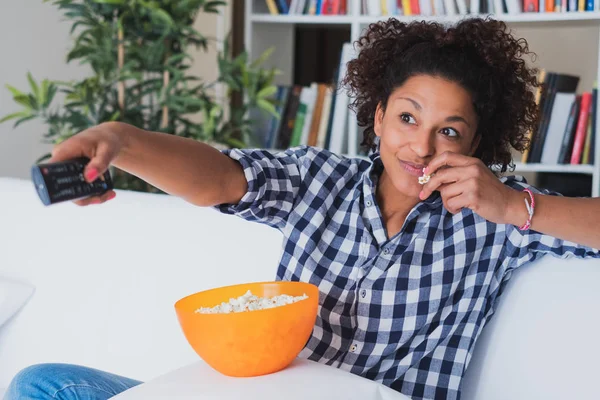 Afro Woman Sitting Home Remote Control Watching — Stock Photo, Image