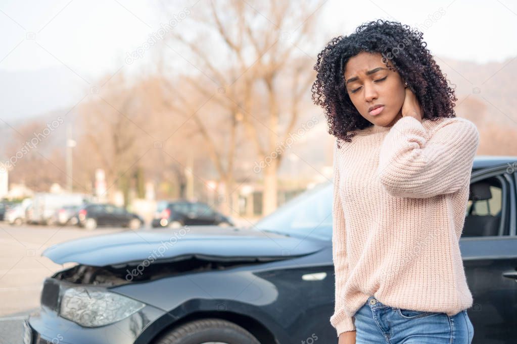 Car accident and black woman feeling pain