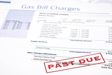 Energy bill paper forms on the table closeup clipart