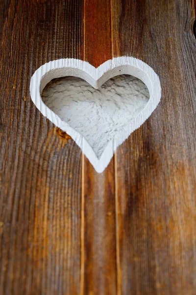 Wooden fence with heart. Part of a window in Tirol, Austria — Stock Photo, Image