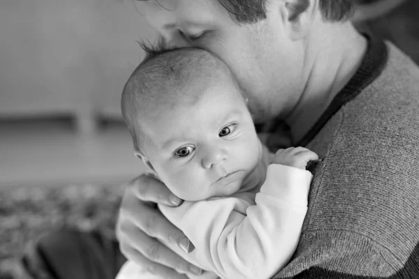 Happy proud young father with newborn baby daughter, family portrait togehter — Stock Photo, Image