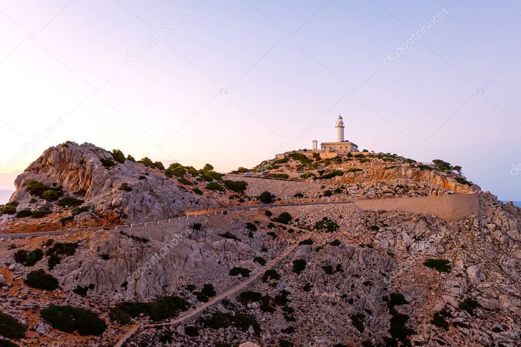 Beautiful white Lighthouse at Cape Formentor in the Coast of North Mallorca, Spain Balearic Islands. Artistic sunrise and dusk landascape.