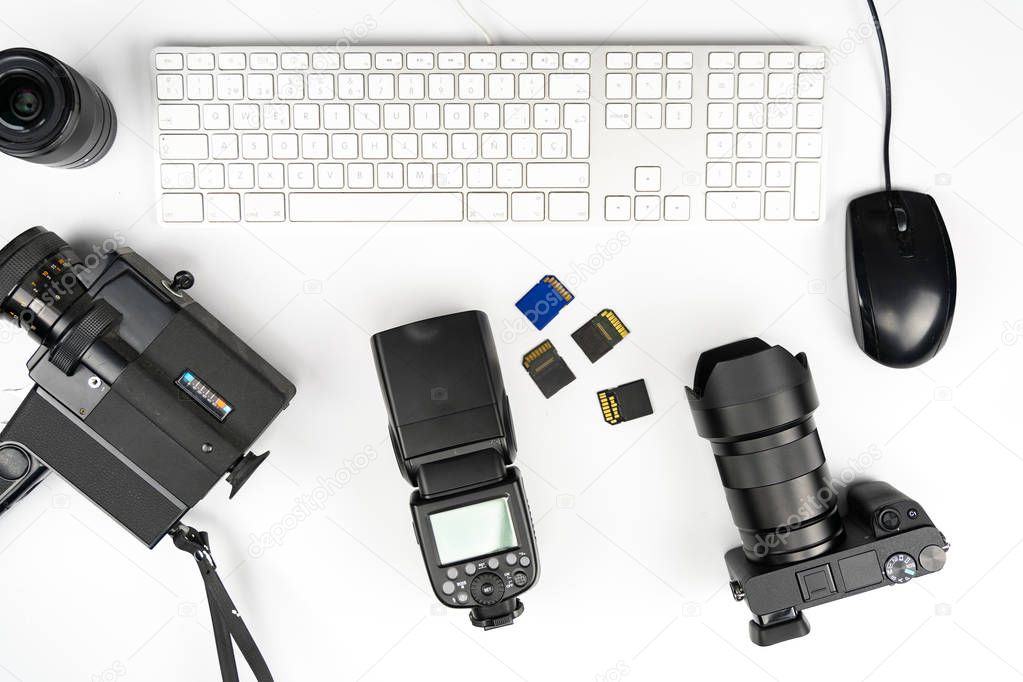 Studio Photography with computers, cameras, flashes and multiple lens