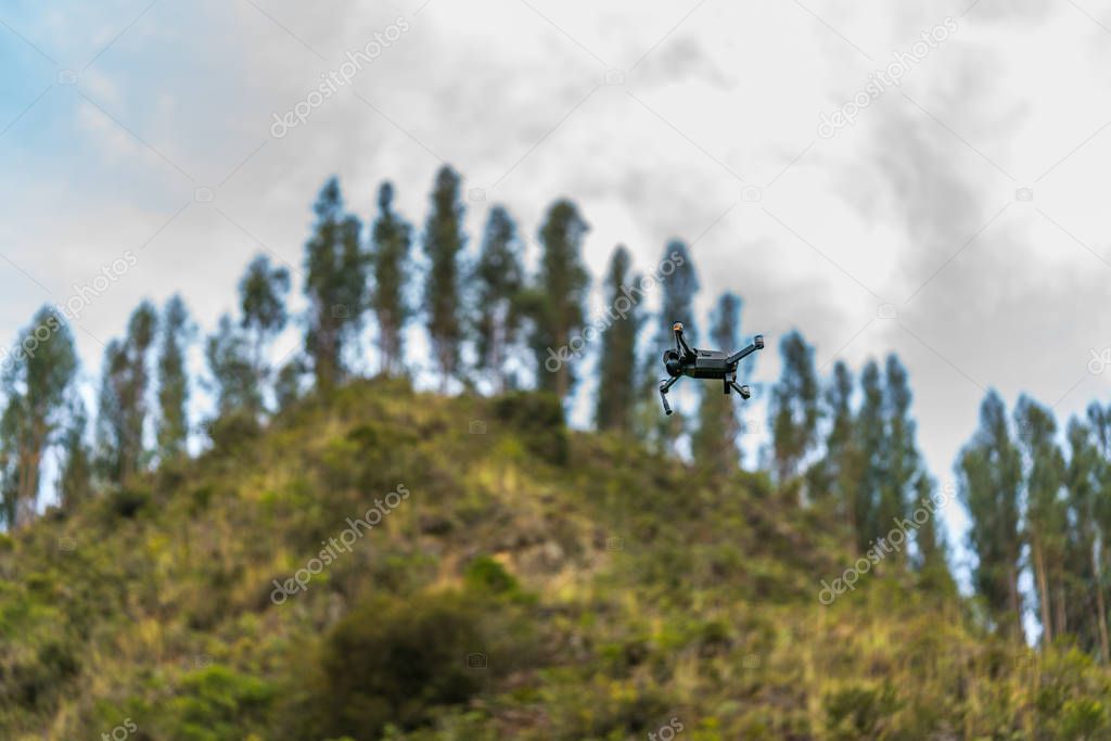Drone DJI Mavic Pro flying in nature