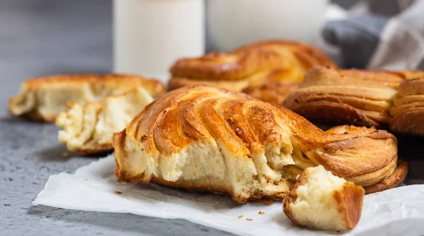 Yeast sweet buns with sugar in the shape of a heart. Traditional russian sweet buns.