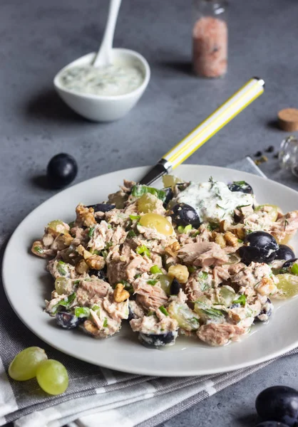 Tuna, green and black grapes salad with natural yogurt dressing. Healthy or food. Light breakfast, lunch or dinner.