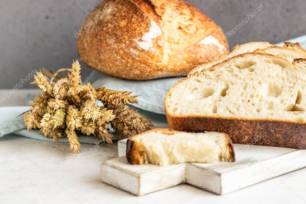 Freshly baked homemade artisan sourdough bread. Sliced. Top view. Copy space.
