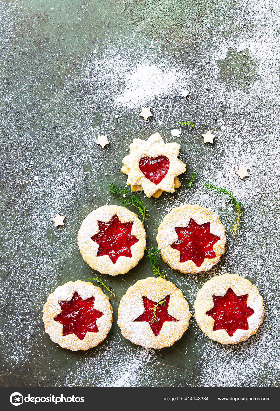 Christmas Or New Year Tree Made From Austrian Linzer Cookies With Jam And Dusted With Sugar Powder On Green Stone Background Holiday Celebration And Cooking Concept Stock Photo C Porosolka Balt 414143384