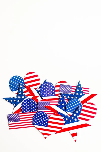 American Independence day background with blue, white and red mixed stars and hearts. Celebration of American independence day, the 4th of July (the Fourth of July). Holiday concept. With copy space.