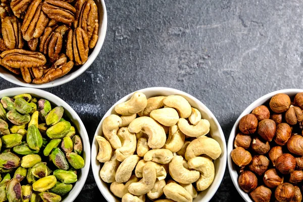 Selection of Mixed Nuts, Pistachio , Pecan , Cashew  and Hazel Nuts — Stock Photo, Image