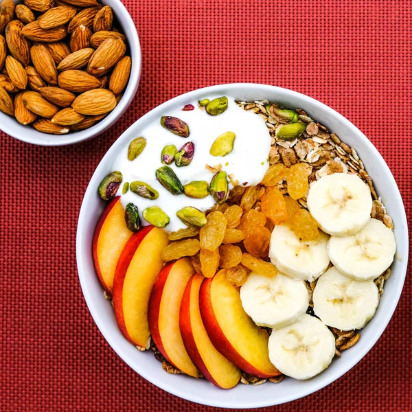 Healthy Vegetarian Breakfast Bowl of Muesli Fruit and Nuts With Sultanas — Stock Photo, Image