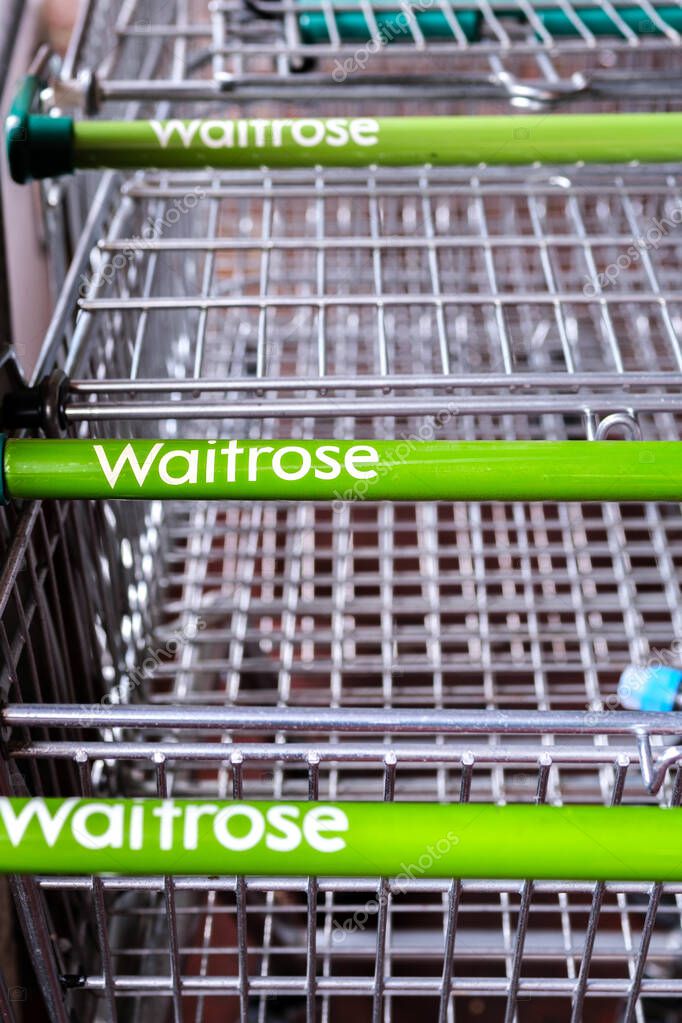 London UK September 15 2025, Abstract Graphic Resouce Of  Three Waitrose Supermarket Parked Trollies or Carts