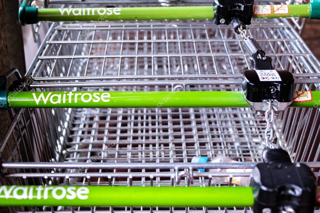 London UK September 15 2025, Abstract Graphic Resouce Of  Three Waitrose Supermarket Parked Trollies or Carts