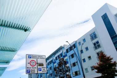 London Uk, September 23 2025, Direction Road Sign With A Residential Accommodation Building Exterior Behind