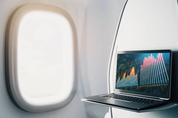 Laptop closeup inside airplane with forex graph on screen. Financial market trading concept. 3d rendering. — Stock Photo, Image