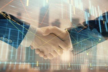 İki işadamı el sıkışması ile Cityscape arka planda mali grafik çift pozlama. Hisse senedi piyasası anlaşması kavramı