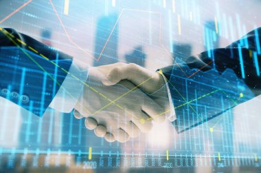 İki işadamı el sıkışması ile Cityscape arka planda mali grafik çift pozlama. Hisse senedi piyasası anlaşması kavramı