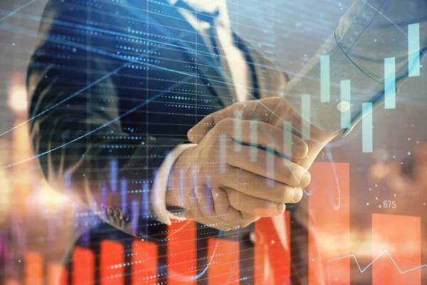 İki işadamı el sıkışması ile Cityscape arka planda mali grafik çift pozlama. Finansal analiz ve yatırım fırsatları konsepti