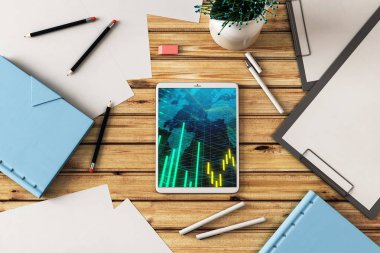 Dijital tablet çekim üst görünümü ile mali grafik ve kısmi Dünya Haritası ekranda. Online uluslararası ticaret uygulama kavramı. 3B işleme.