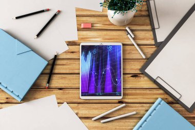 Dijital tablet ekranda mali grafik ile üst görünüm çekim. Online işlem uygulama konsepti. 3B işleme.