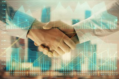 İki işadamı el sıkışması ile Cityscape arka planda mali grafik çift pozlama. Hisse senedi piyasası anlaşması kavramı