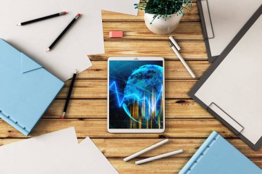Dijital tablet çekim üst görünümü ile mali grafik ve kısmi Dünya Haritası ekranda. Online uluslararası ticaret uygulama kavramı. 3B işleme.