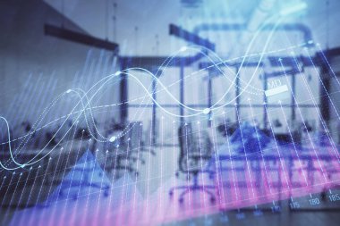 Arka planda ticaret masası banka Ofisi İç ile stok ve tahvil piyasa grafiği. Çok pozlama. Finansal analiz konsepti