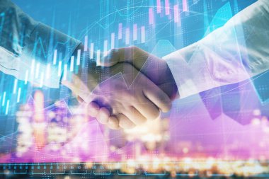 İki işadamı el sıkışması ile Cityscape arka planda mali grafik çift pozlama. Finansal analiz ve yatırım fırsatları konsepti