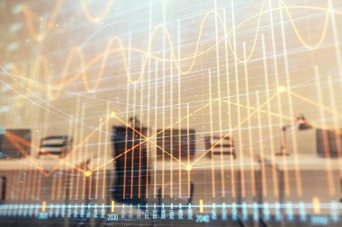 Arka planda ticaret masası banka Ofisi İç ile stok ve tahvil piyasa grafiği. Çok pozlama. Finansal analiz konsepti