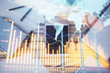 Masa arka planında yer alalı dijital tablette forex grafiği nin ve dünya haritasının çift pozlaması. Piyasa analizi kavramı