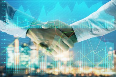 İki işadamı el sıkışması ile Cityscape arka planda mali grafik çift pozlama. Finansal analiz ve yatırım fırsatları konsepti