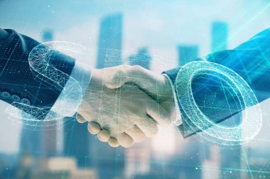 İki kişi el sıkışması ile şehir görünümü arka planda SEO işareti hologram çift pozlama. İş içinde arama optimizasyonu kavramı