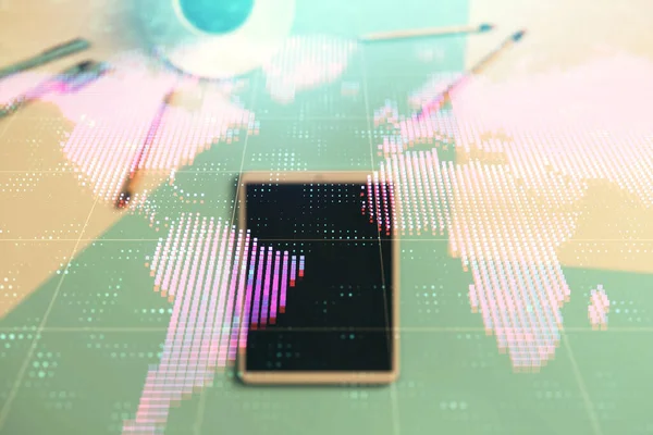 Double exposure of world map drawing on digital tablet laying on table background. Concept of international trade