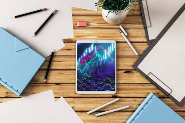 Dijital tablet ekranda mali grafik ile üst görünüm çekim. Online işlem uygulama konsepti. 3B işleme.
