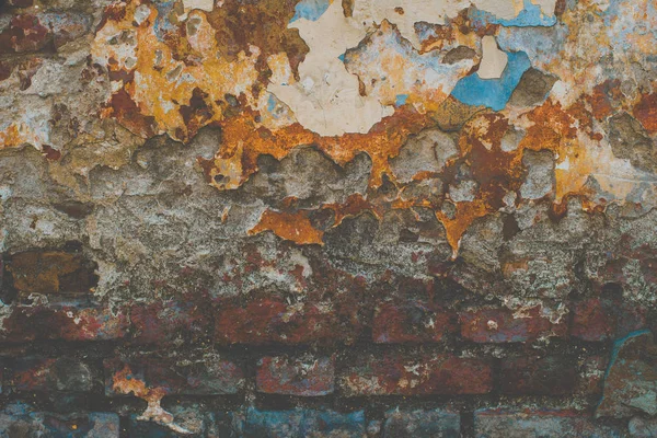 Old flaky paint off a grunge cracked wall. — Stock Photo, Image