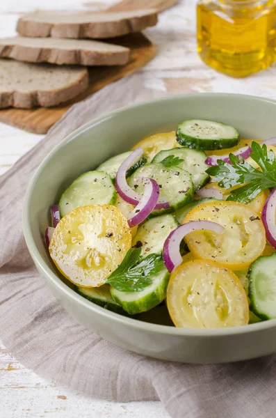 Salad of fresh vegetables with oil and spices. Selective focus.