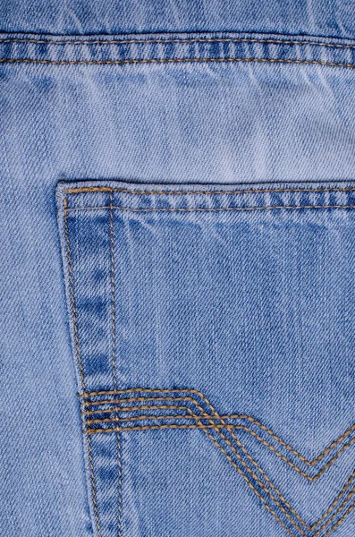 Denim. Blue jeans. Textile denim background. Selective focus.