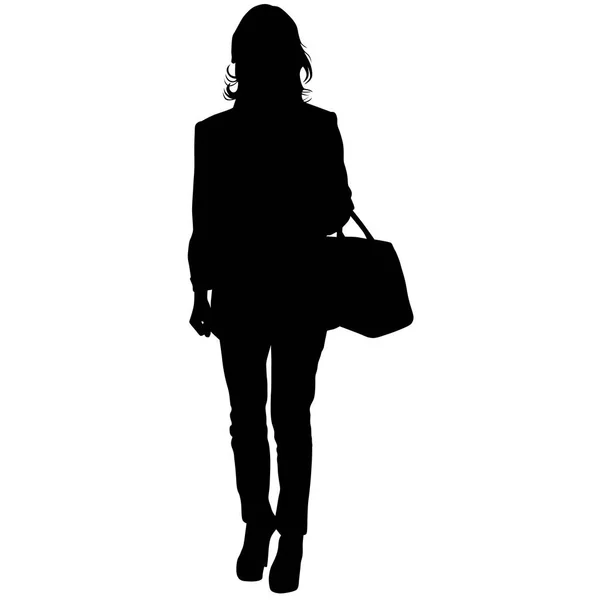 Mulher está de pé com um saco e calças —  Vetores de Stock
