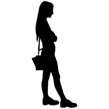 uzun saç ve mini etek ile bir kadın ile bir çanta duruyor