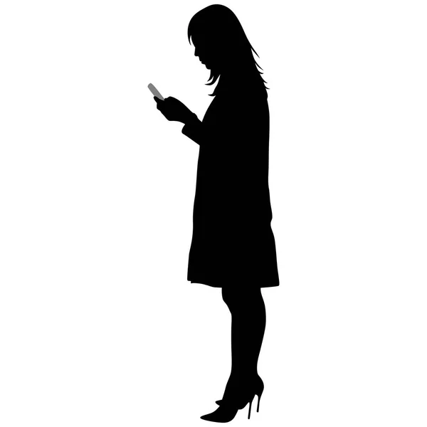 Mujer de abrigo con zapatos y teléfono — Vector de stock