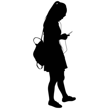 Gözlüklü kız sırt çantası spor ayakkabı ve telefon ile