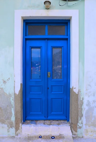 Blue Door Evil Eyes Charms Kastellorizo Grecia —  Fotos de Stock